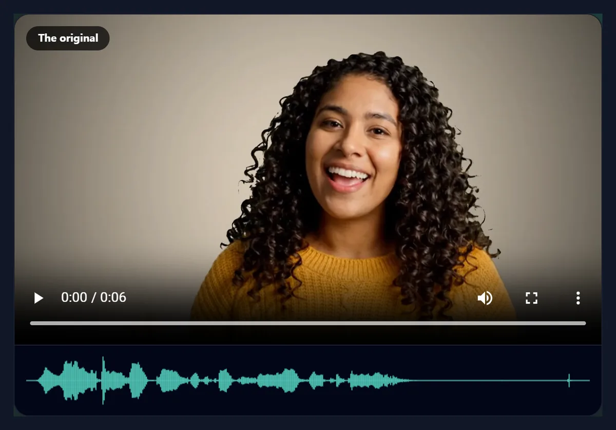The remove audio tool with the sample open: a woman in a yellow jumper waving, with the waveform of her voice under the video