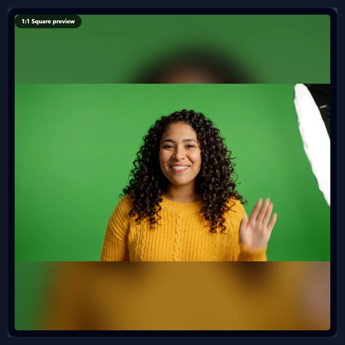 A square preview of the video fitted over a blurred, darker copy of itself filling the top and bottom